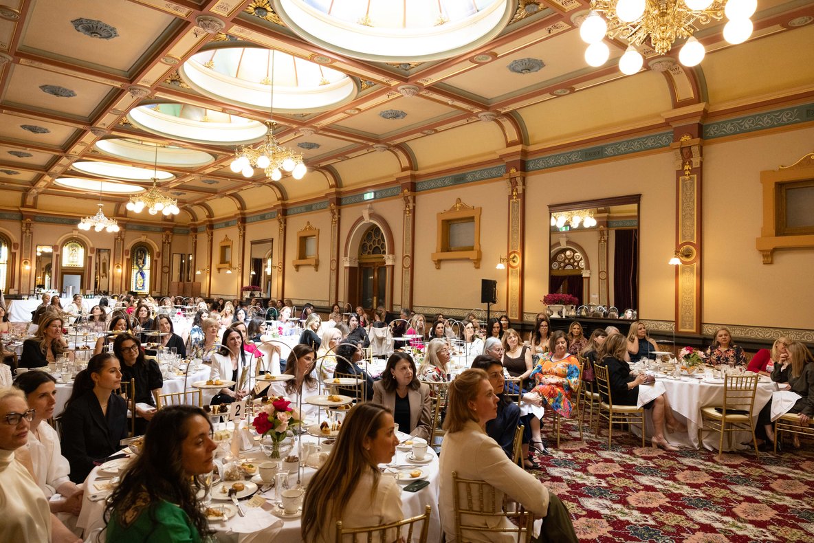 Guests at High Tea in the Grand Ballroom of The Hotel Windsor